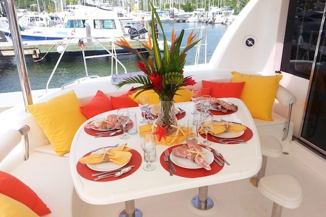 Photo of a set table for 6 on the USVI Catamaran Charter Starfish