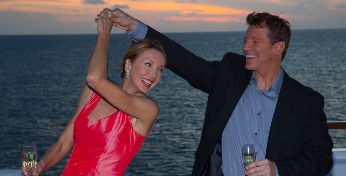 DANCE in the Moonlight romantic couple on deck of a luxury yacht charter