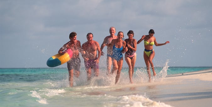 couples running on BVI beach