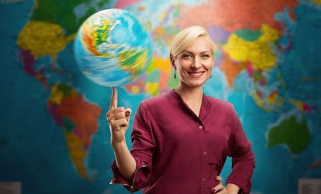 yacht charter broker spinning a globe