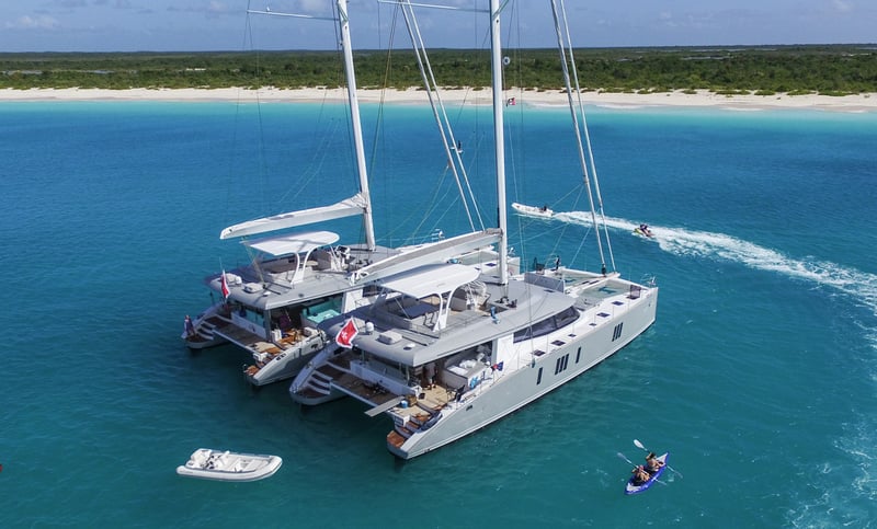 Tandem Catamaran Charter Anchored in Barbuda