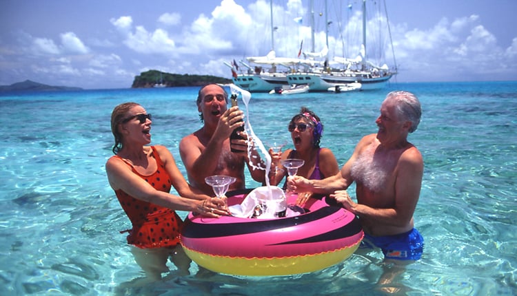 People partying off the stern of charter boats