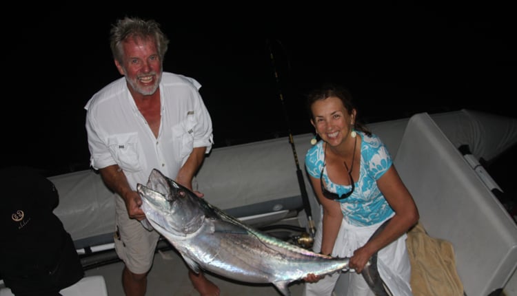 Charter brokers of Ocean Getaways landing a tuna in Bali