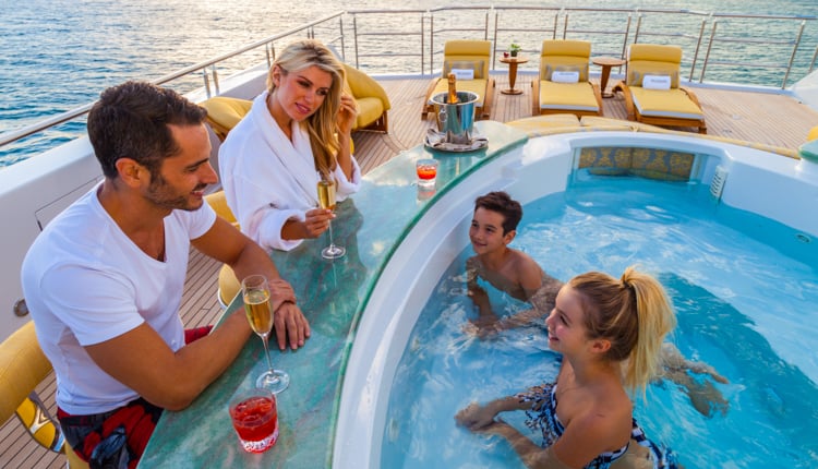 Families on a luxury yacht charter vacation