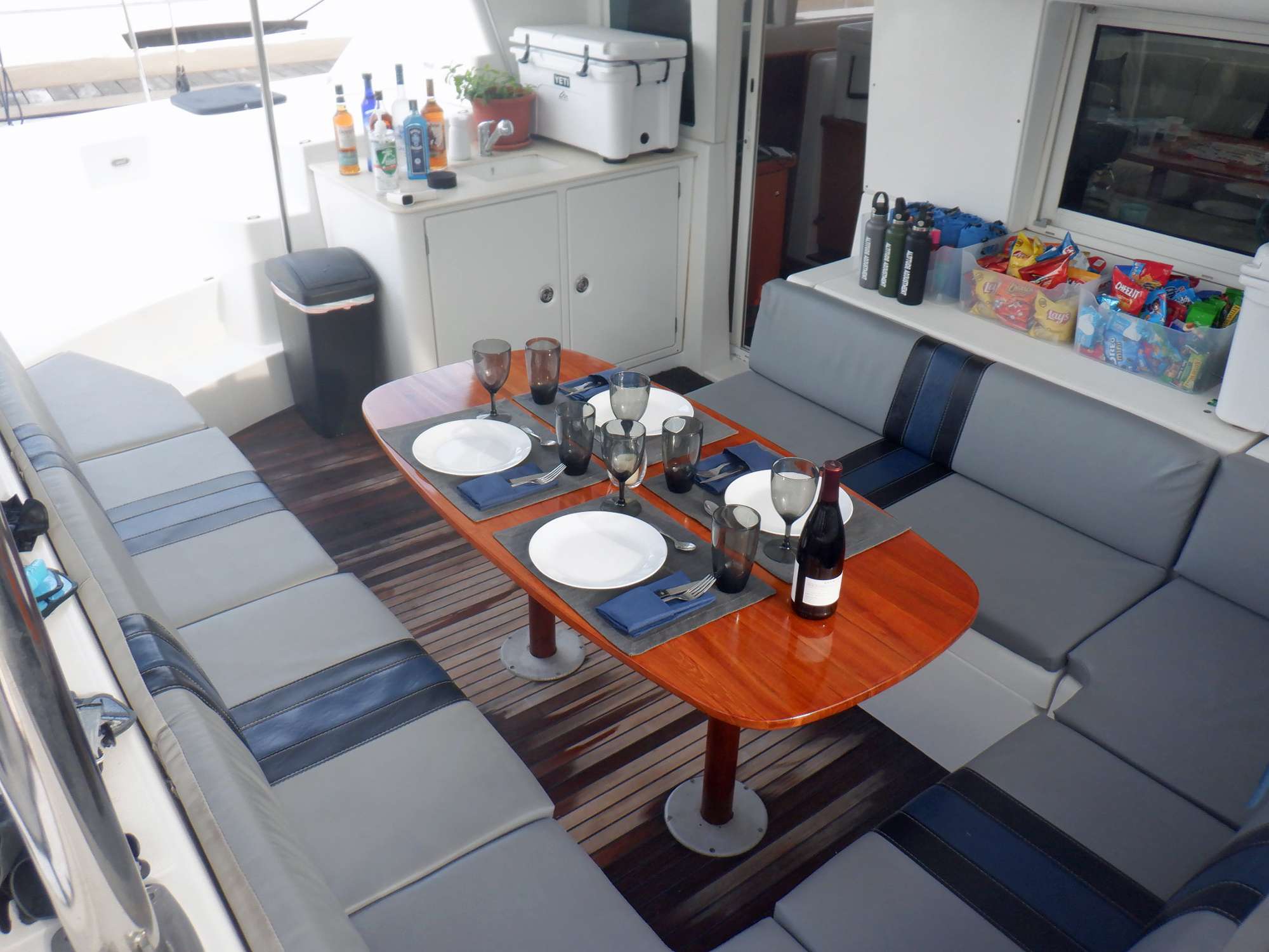 Catamaran Yacht 'ALTITUDE ADJUSTMENT' Spacious seating on aft deck, 6 PAX, 1 Crew, 44.00 Ft, 13.00 Meters, Built 2007, Lagoon, Refit Year 2014/2021 - New hard top over the fly bridge and new name graphics