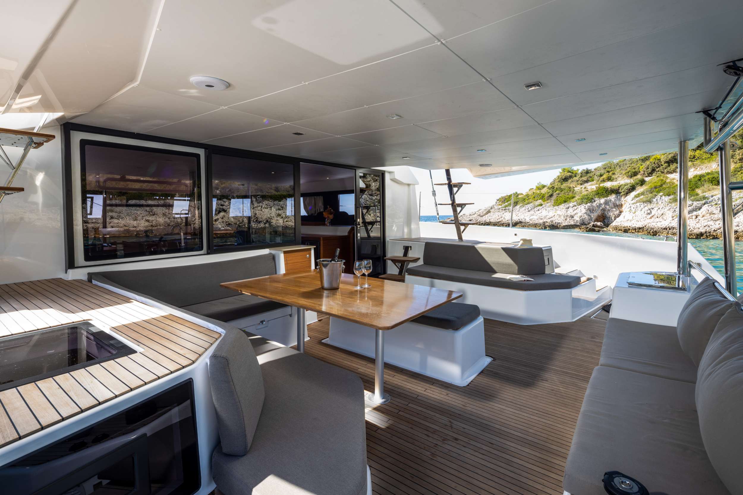 Catamaran Yacht 'UTOPIA' Cockpit dining area, 8 PAX, 2 Crew, 48.00 Ft, 14.00 Meters, Built 2023, Dufour