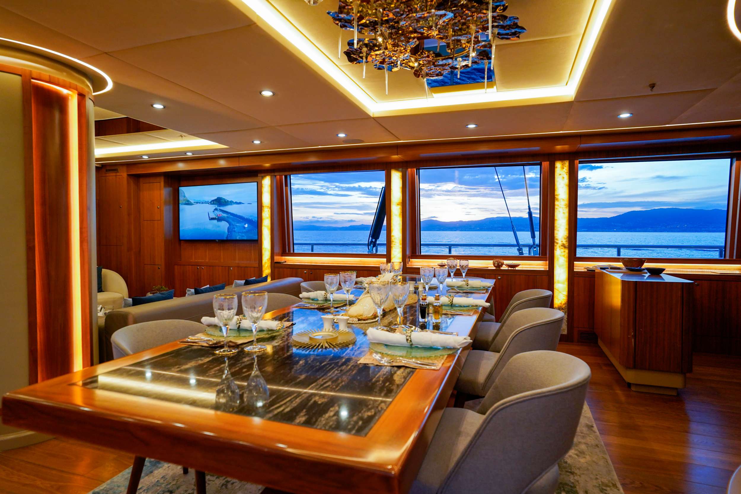 Motor Sailing Yacht 'ARESTEAS' Main salon table, 12 PAX, 166.00 Ft, 50.00 Meters, Built 2017, Refit Year 2022