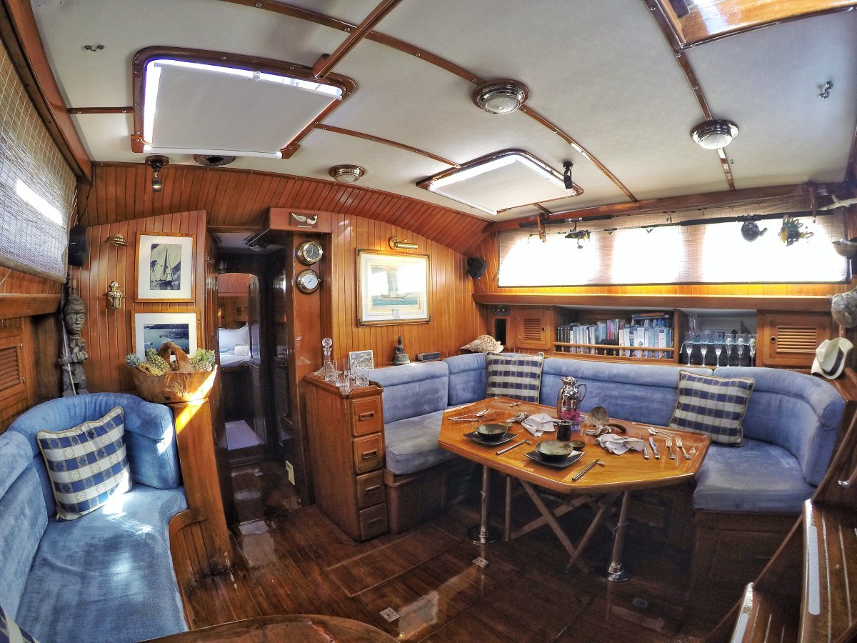 Sailing Yacht 'THE DOVE' Salon Area, 4 PAX, 2 Crew, 54.00 Ft, 16.00 Meters, Built 1988 France , W.I. Crealock, Refit Year 2025 - lovely new interior upholstery from France. Aft and forward new chain plates, and new anchor roller. 2023 - new pramhood, new 