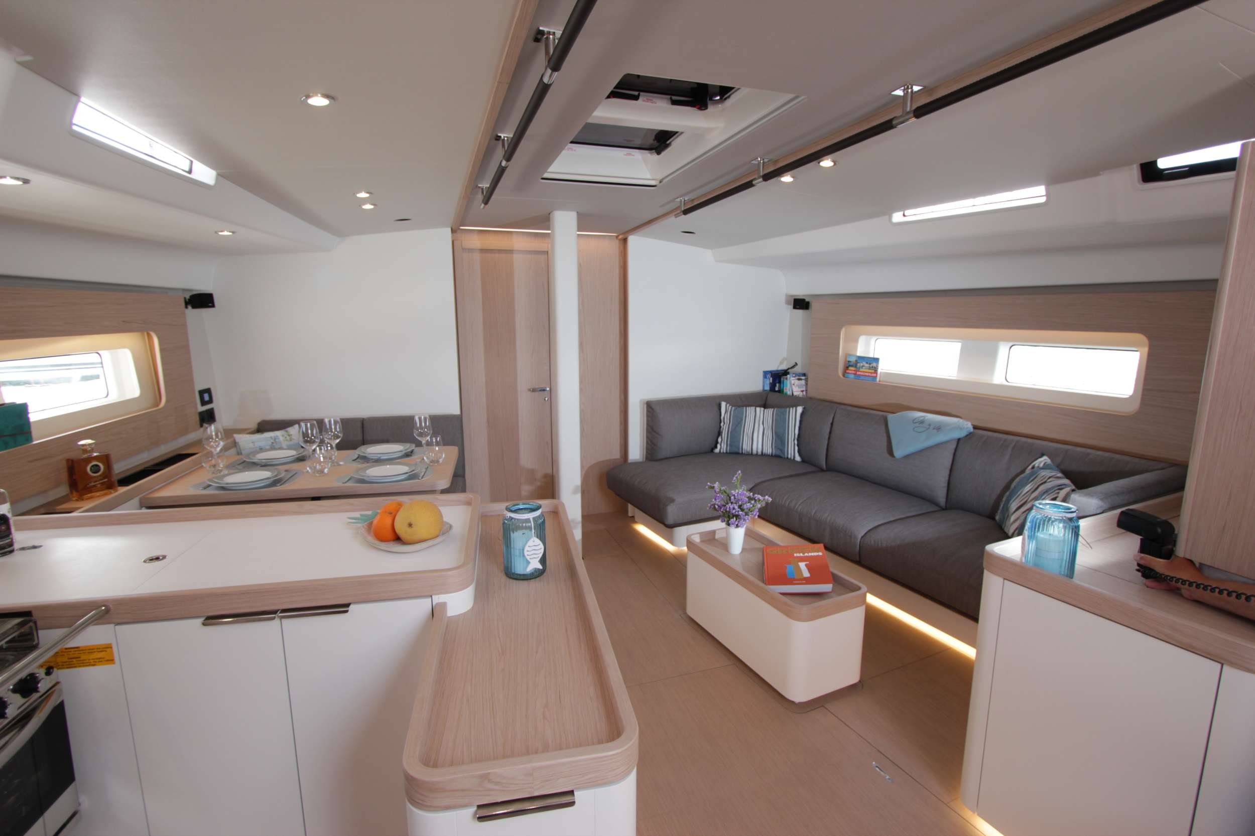 Sailing Yacht 'ON Y VA' Main Salon and dining area, 6 PAX, 2 Crew, 56.00 Ft, 17.00 Meters, Built 2023, Beneteau