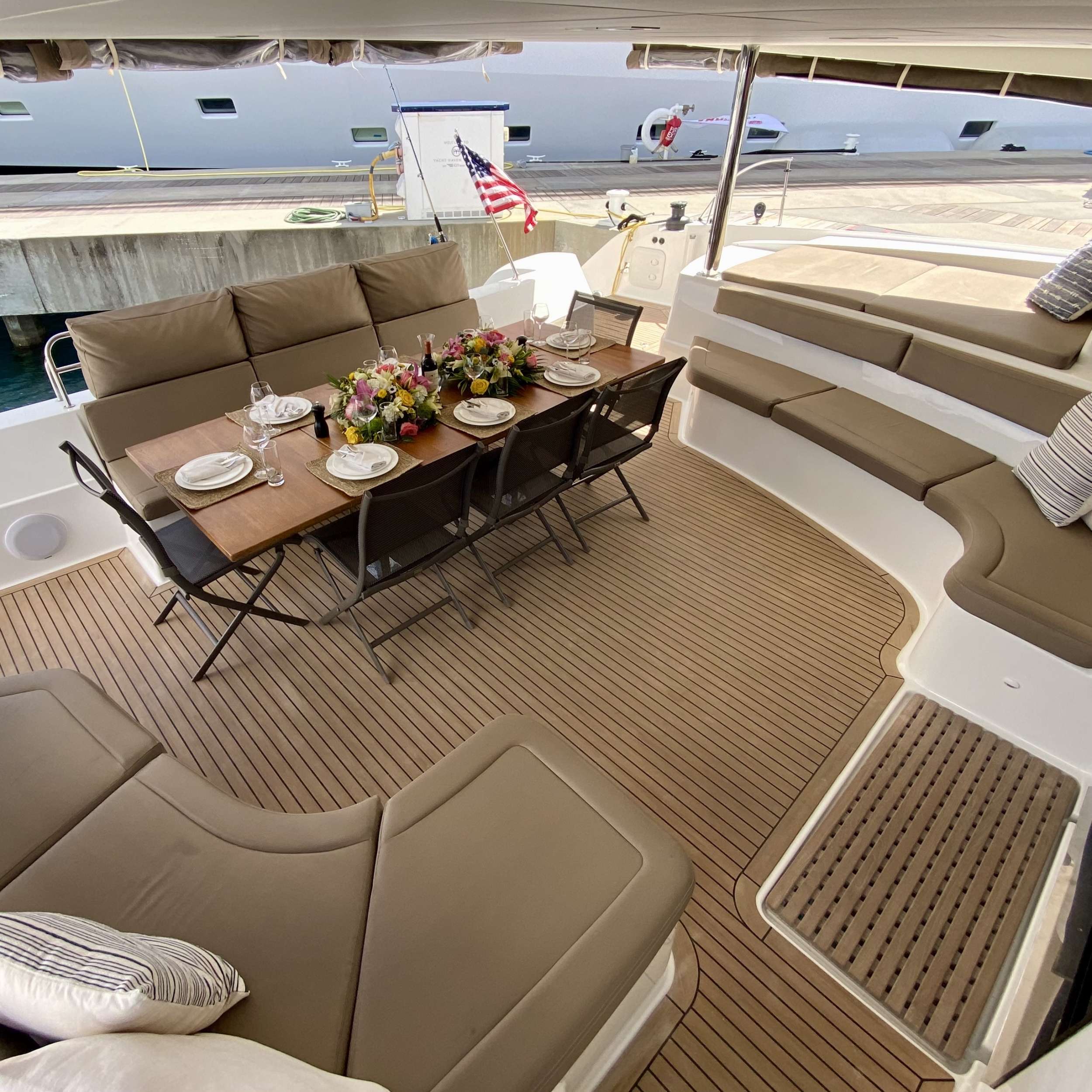 Catamaran Yacht 'SOME KIND OF WONDERFUL' Aft dining table, 8 PAX, 2 Crew, 72.00 Ft, 21.00 Meters, Built 2016, Fountaine Pajot, Refit Year 2023