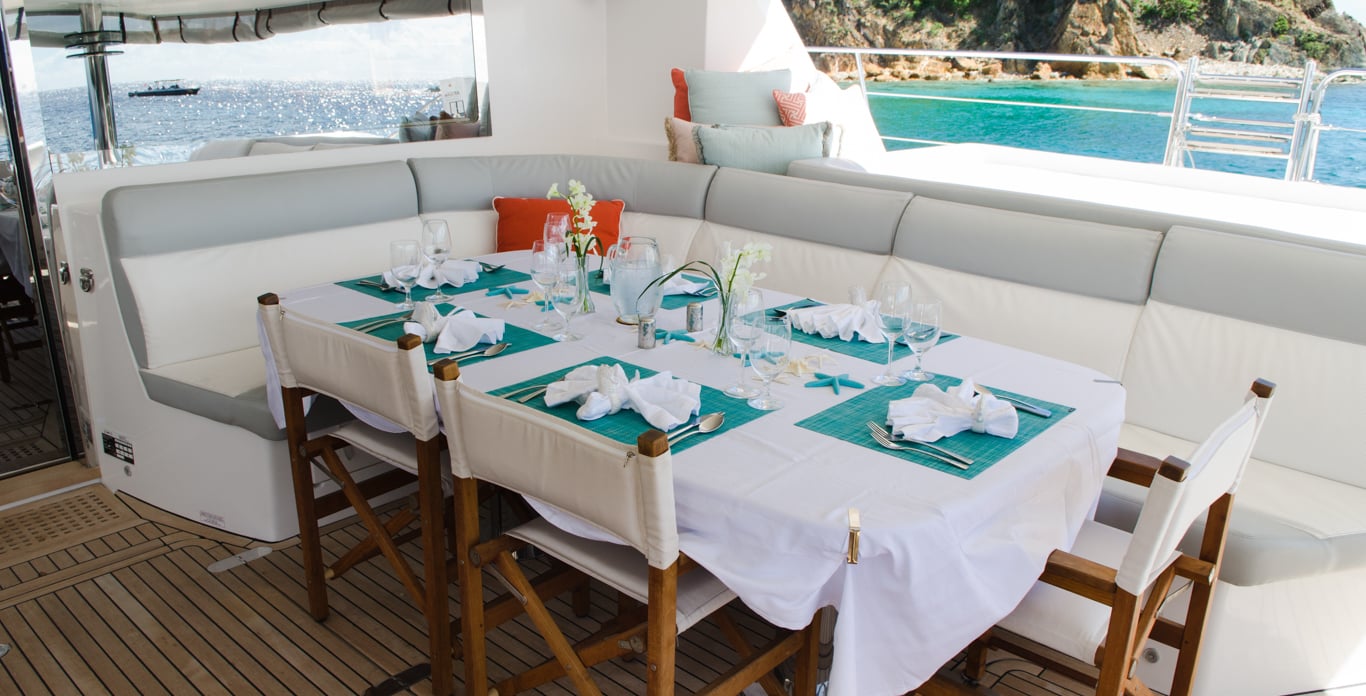 Al fresco dining on a crewed catamaran