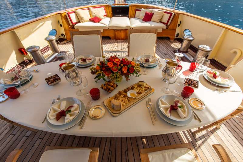 Motor Yacht 'DP MONITOR' Alfresco table setting, 10 PAX, 5 Crew, 98.00 Ft, 30.00 Meters, Built 1991, Benetti, Refit Year 2011/2012/2020
