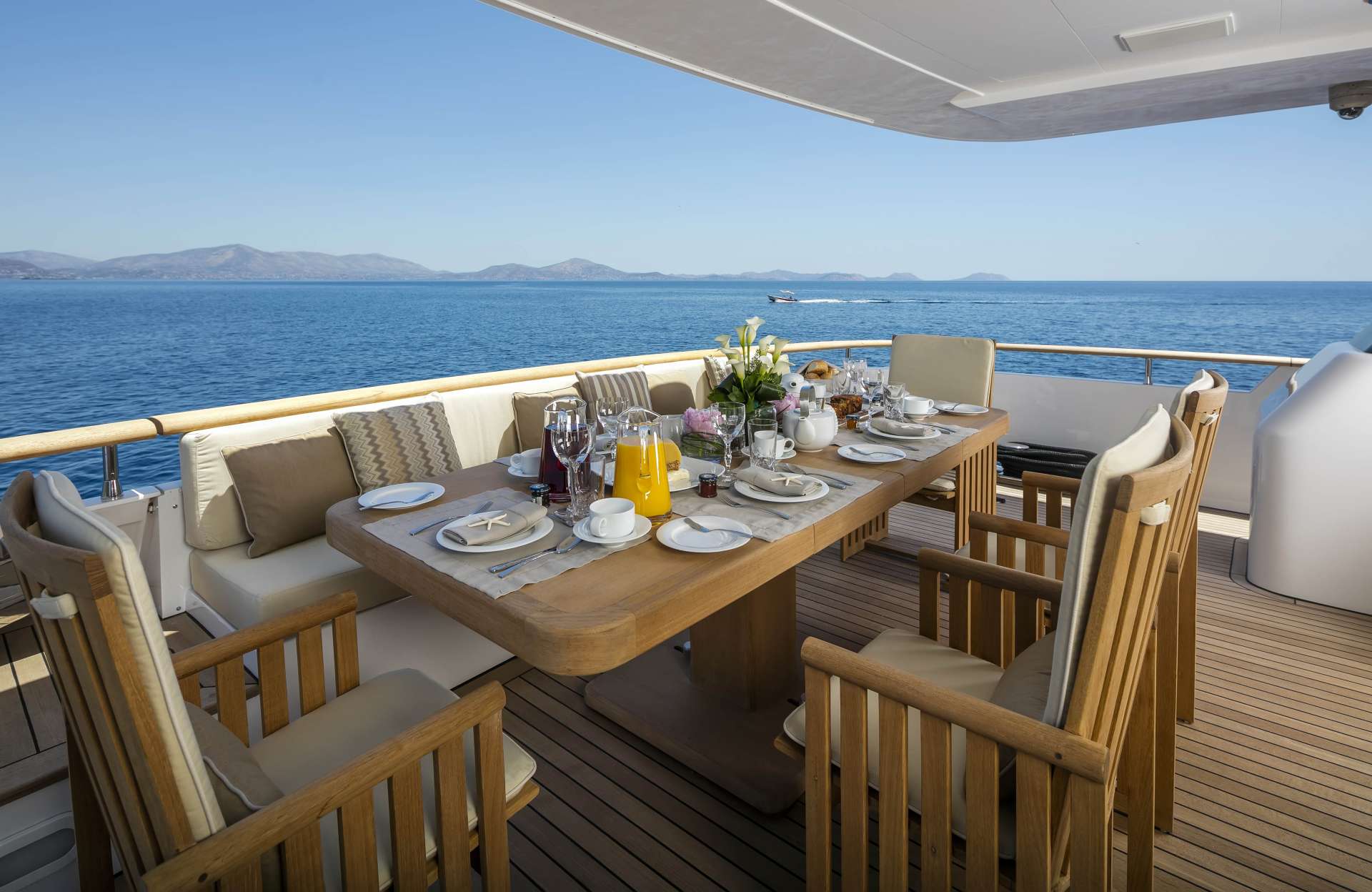 Motor Yacht 'ALEXIA AV' Dining table, 10 PAX, 6 Crew, 110.00 Ft, 33.00 Meters, Built 2006, Cantieri di Pisa, Italy, Refit Year 2017